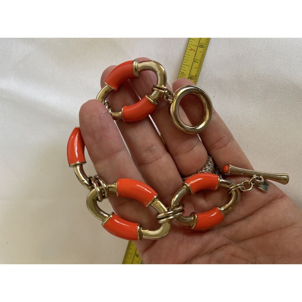 Banana Republic gold and orange enamel chain link bracelet with toggle.